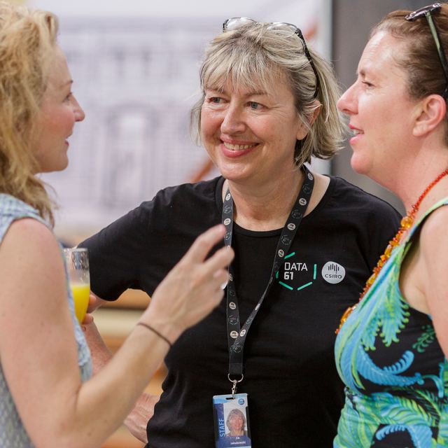 Two women in conversation at a Spark Festival networking event